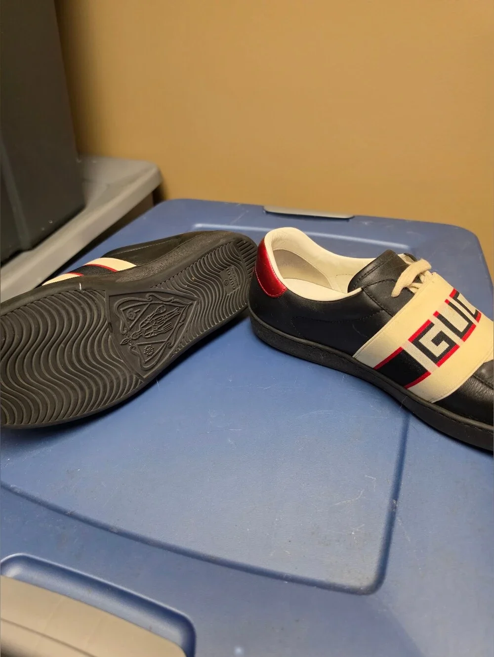 Gucci Men’s Black Leather New Ace Sneakers with Red Heel and Beige Branded Strap